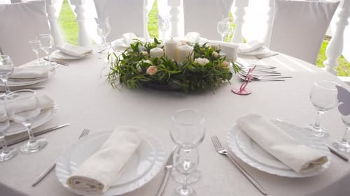 Beautifully Set Wedding Table with Floral Centerpiece