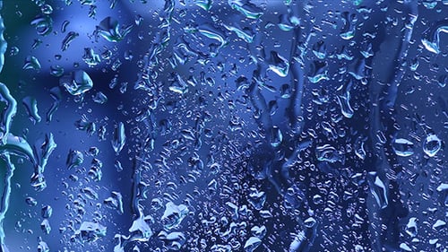 Abstract Raindrops on Glass in Blue