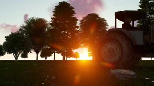 Tractor Working In The Field Sunset