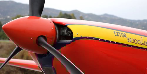 Close Up Of Red Plane Propeller Spinning