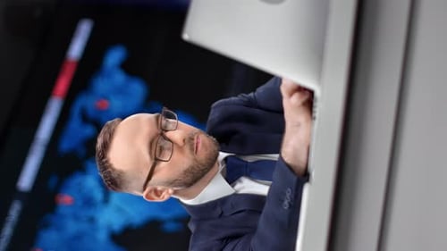 VERTICAL VIDEO POV Focused Business Male in Tie Suit Working Use Laptop at Hi Tech Office Desk