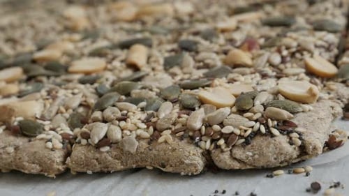 Close-up chrono food with peanut baked goods 2160p 30fps UltraHD footage - Shallow DOF healthy whol