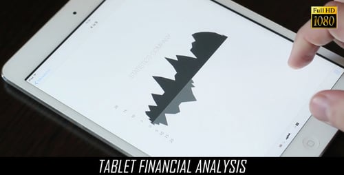 Tablet Displaying Business Charts and Graphs