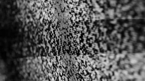 Black and White Static Noise on a Television Screen