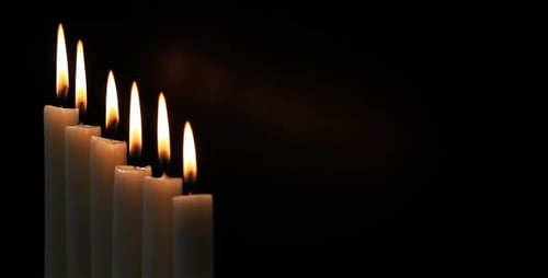 Candles Burning Brightly in the Dark