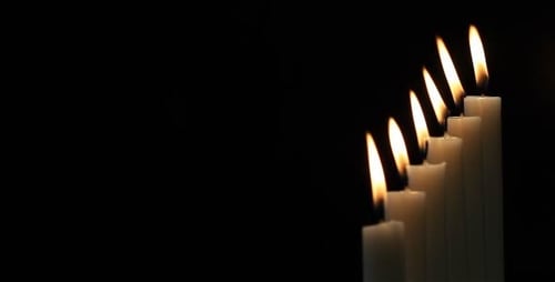 Seven Candles Glowing in the Dark