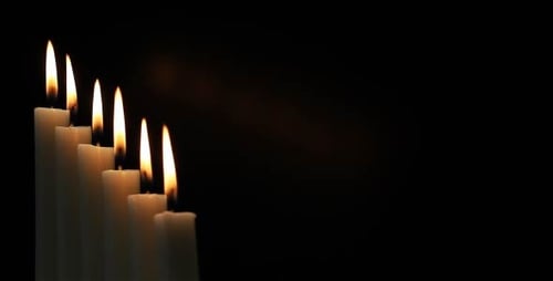 Candles Burning Brightly in the Dark