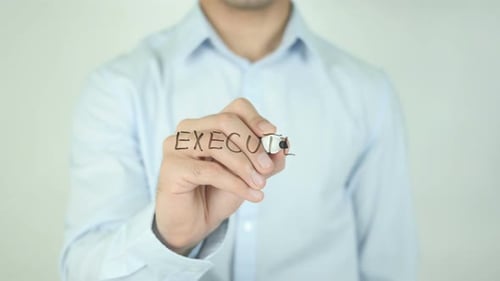 Writing Execute on Clear Surface With Black Marker