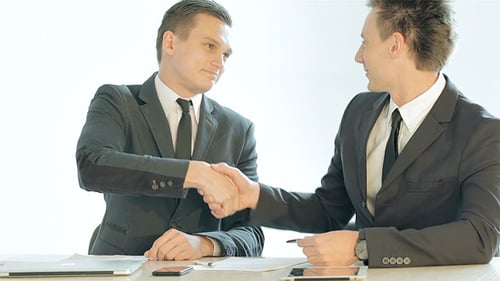 Business Meeting Between Two Men in an Office