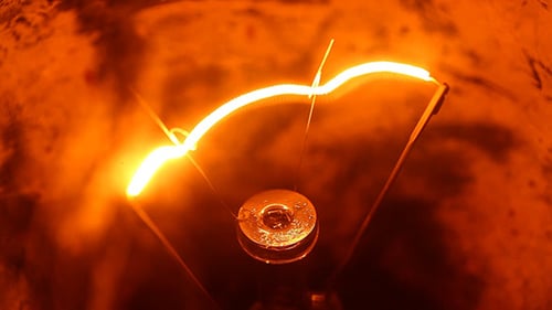 Glowing Filament Inside an Incandescent Light Bulb