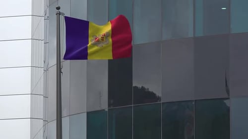 Andorra National Flag Waving Against Modern Office Building