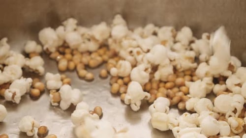 Delicious Popcorn Cooking in Pan with Oil