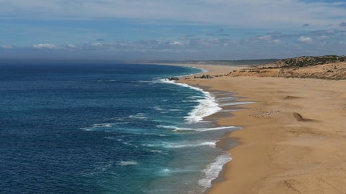 Waves Crashing on Rocks and Beach 893