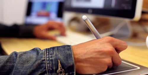 Designer Using A Tablet Mouse