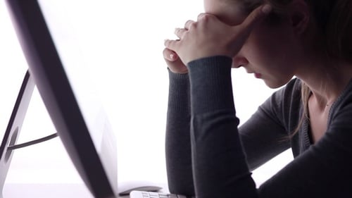 Woman Typing then Overwhelmed at Computer