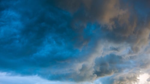 Dramatic Blue and Gray Clouds Billowing in the Sky