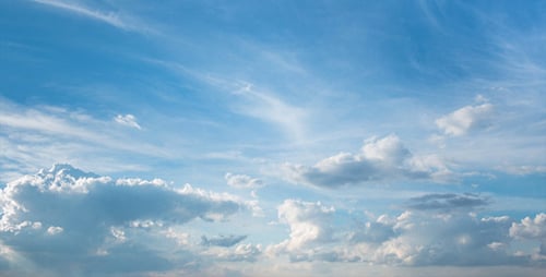 Billowing White Clouds in Blue Sky Time Lapse