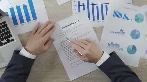 Business Contract Signing at Modern Workplace