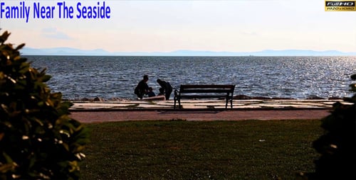 Family Near The Seaside