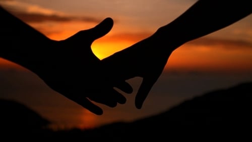 Holding Hands at Sunset