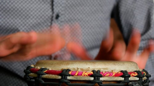 Hands Playing Drum