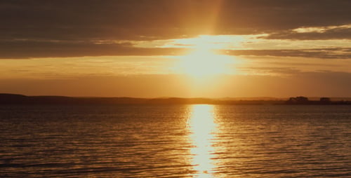 Golden Sunset Shining Over the Water