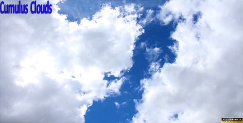 White Clouds Drifting across Blue Sky