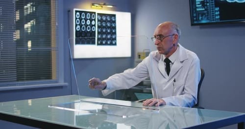 Doctor Using Transparent Display Screen
