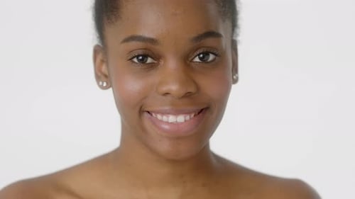 Close Up of Smiling Woman on White