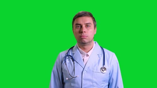 Young Doctor Stand and Smile on Green Chroma Key Background