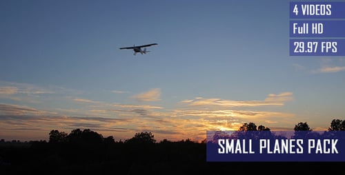 Small Airplane Flies Across Colorful Sunset Sky