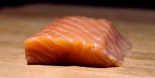 Salmon Fillet Sliced on a Cutting Board