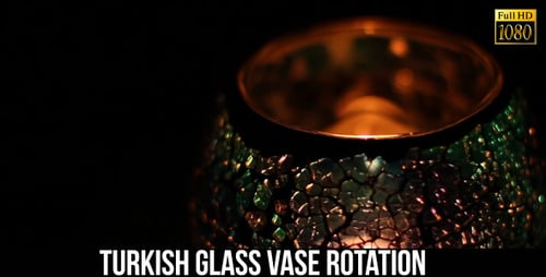 Candle Burning Inside Decorative Mosaic Holder