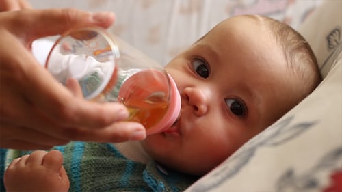 Baby Drinking Tea