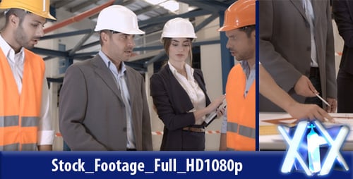 Construction Team Reviews Blueprints on Site