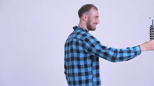 Smiling Man on Phone Video Chat Waving
