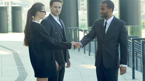 Diverse Business Team Meeting and Walking