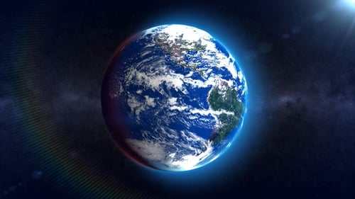 Rotating Earth Globe with Blue Glow in Space Background