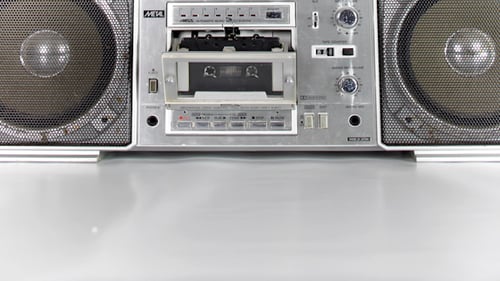Retro Silver Boombox with Tangled Cassette Tape