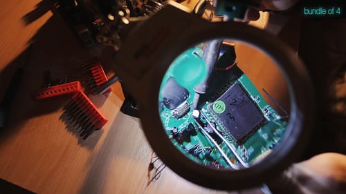 Soldering Circuit Board with Soldering Iron