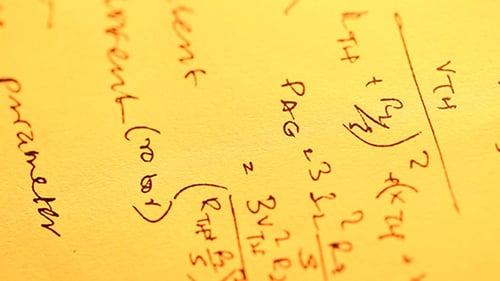 Intricate Equations on Yellowed Scientific Paper