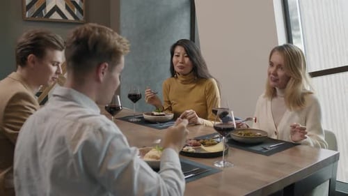 Friends Dining In Restaurant