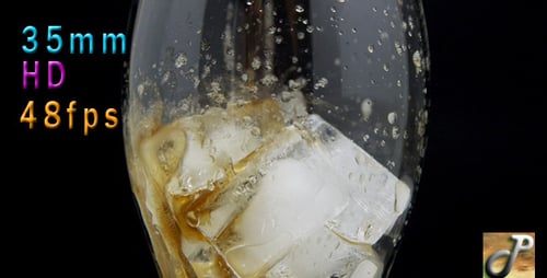 Refreshing Cola Poured over Ice in Glass