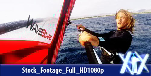 Young Adult Windsurfing on Sparkling Blue Ocean