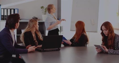 Team Discussing Data at Modern Office Meeting