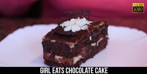 Smoothing Icing on a Chocolate Cake with Spoon