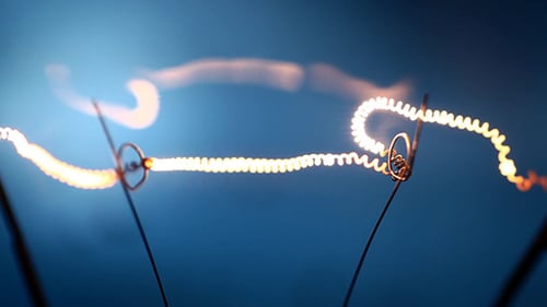 Incandescent Light Bulb Filament Glowing Brighter