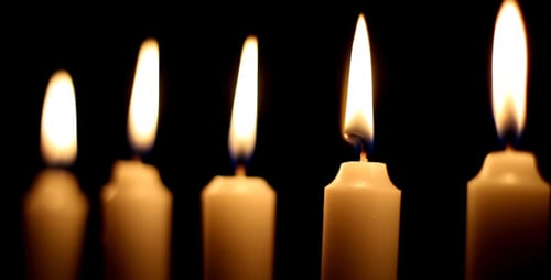 Candlelight Flickering in the Darkness at Night