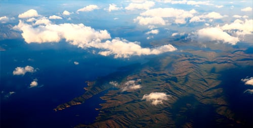 Aerial View of Mountains and Ocean Coastline