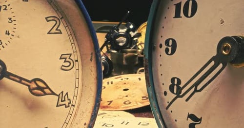 Retro watchmakers workshop with spare parts and broken clocks